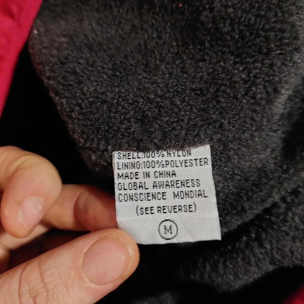 Y2K red vest with dark grey lining.